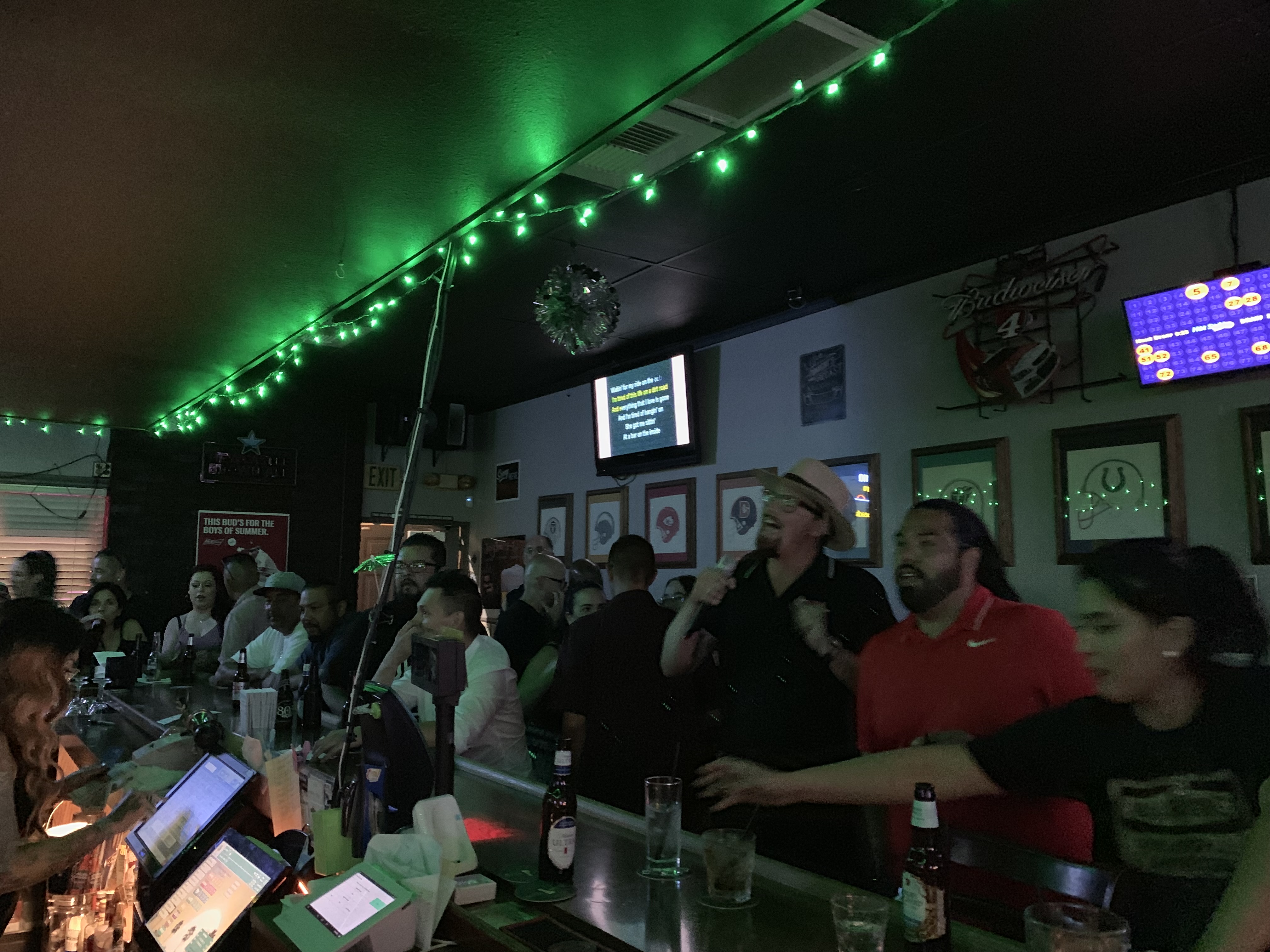 full bar with patrons enjoying themselves