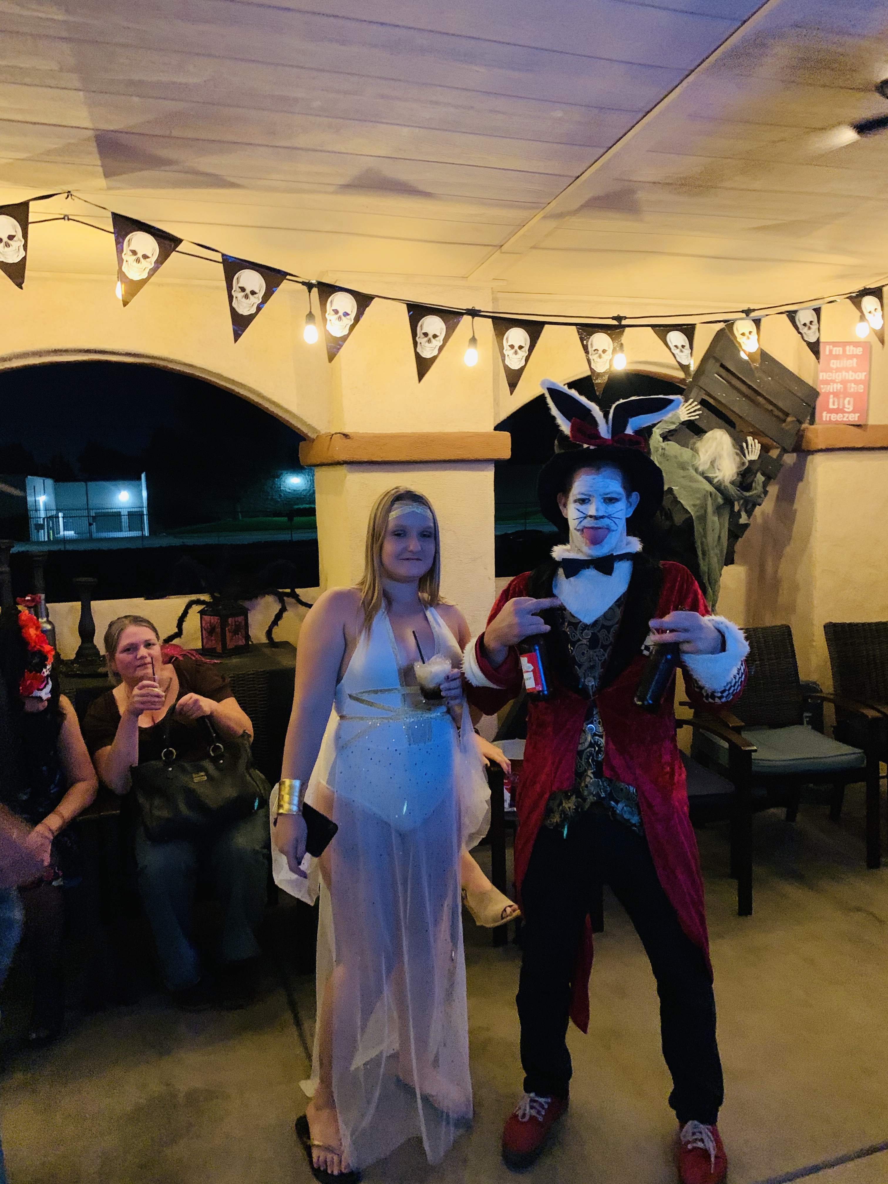 people enjoying halloween party and beers