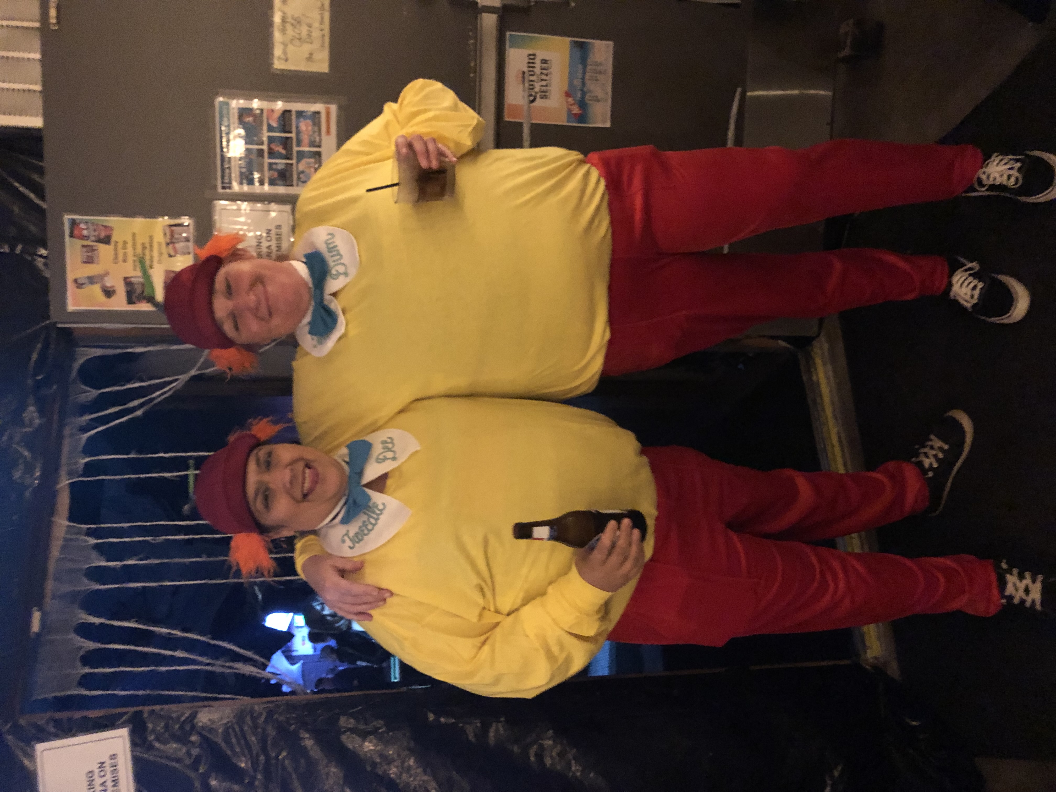 two people dressed up as Tweedledum and Tweedledee from Alice in Wonderland